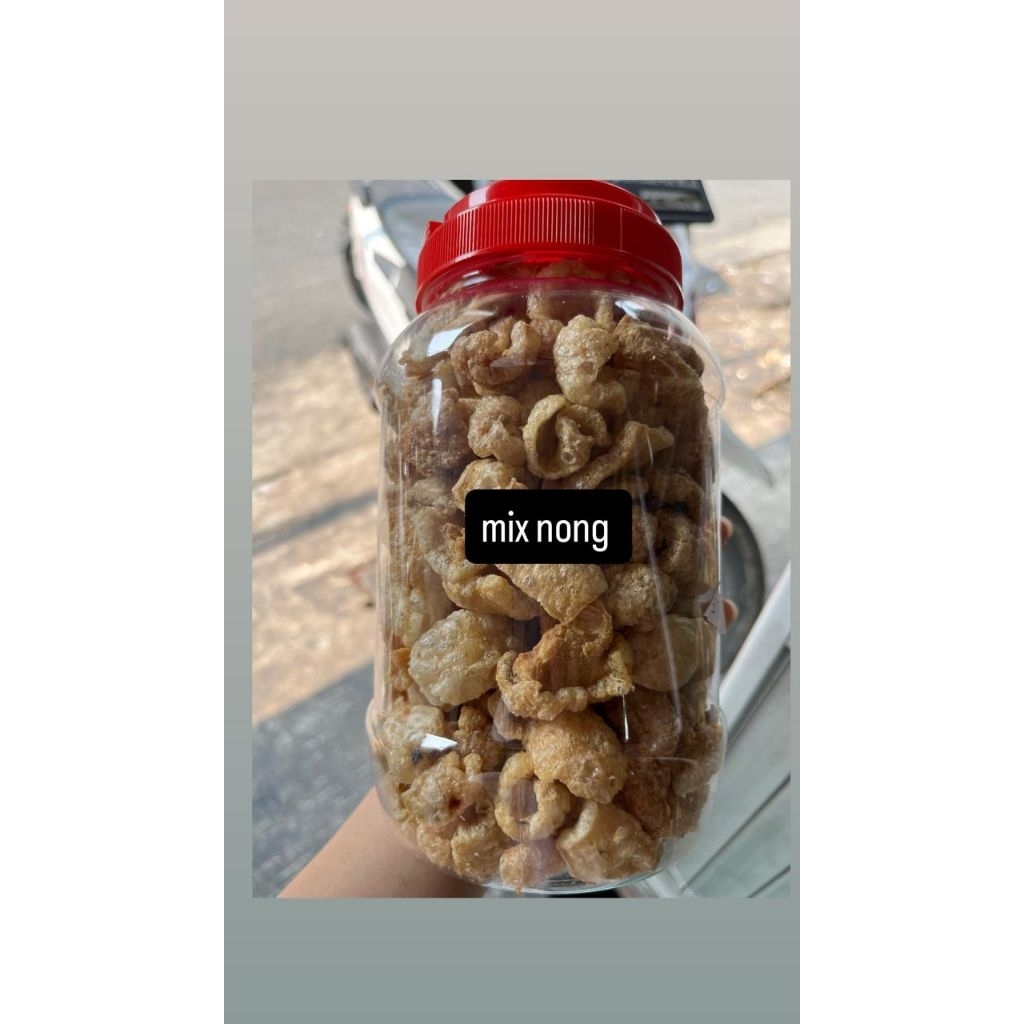 

KERUPUK KULIT BABI CU JIU CA CAMPUR LEMAK DAN NON LEMAK JAMIN GURIH DAN MAKNYUS