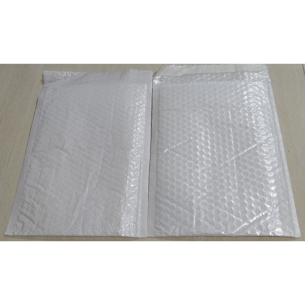 

Bubble Mailer/ Amplop Bubble Ukuran 20x30cm Warna Putih Jual PerPcs