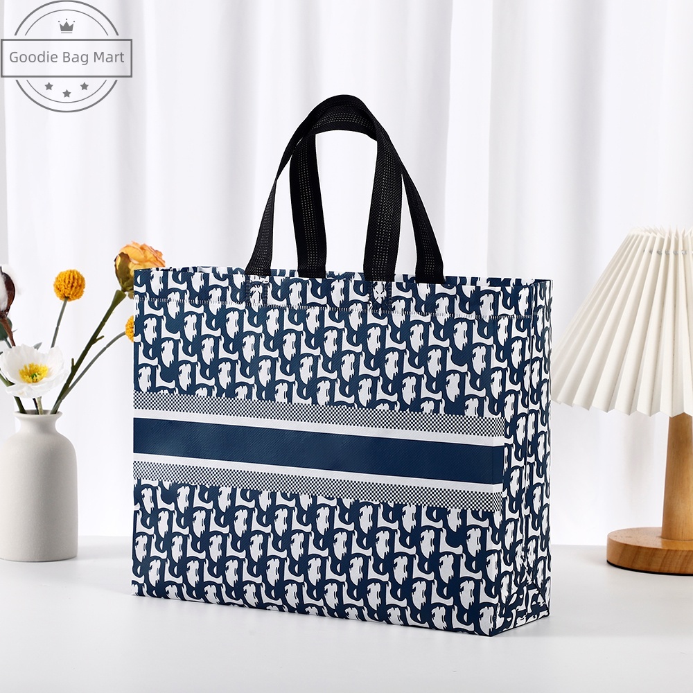 

Membentuk-A56/Goodie bag-Tas Belanja tas Jinjing tas spunbond tas souvenir premium tebal dan kuat/Terlaris lipat jumbo/ waterproof/shopping bag Tas Belanja Murah Karakter Kartun