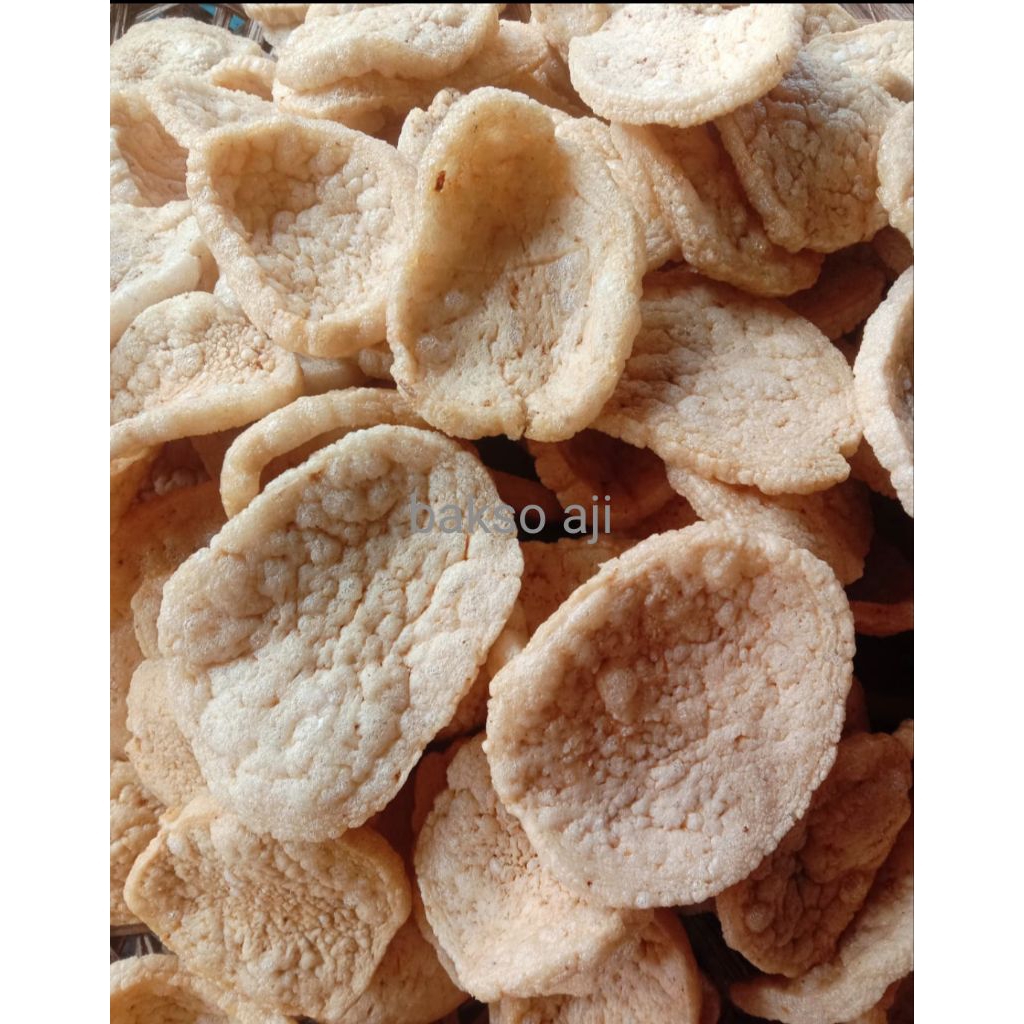 

Krupuk goreng ikan dencis segar, berat 1/2 kg