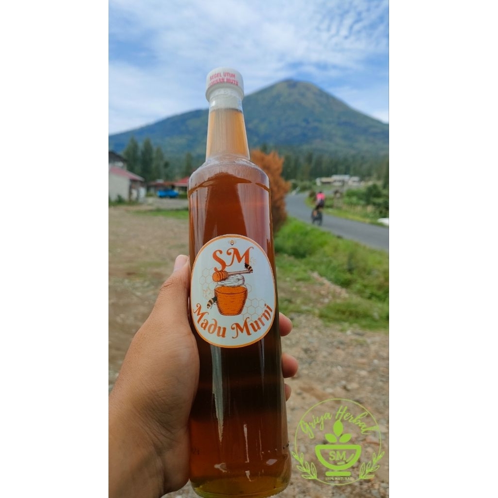 

Madu murni kemasan botol marjan