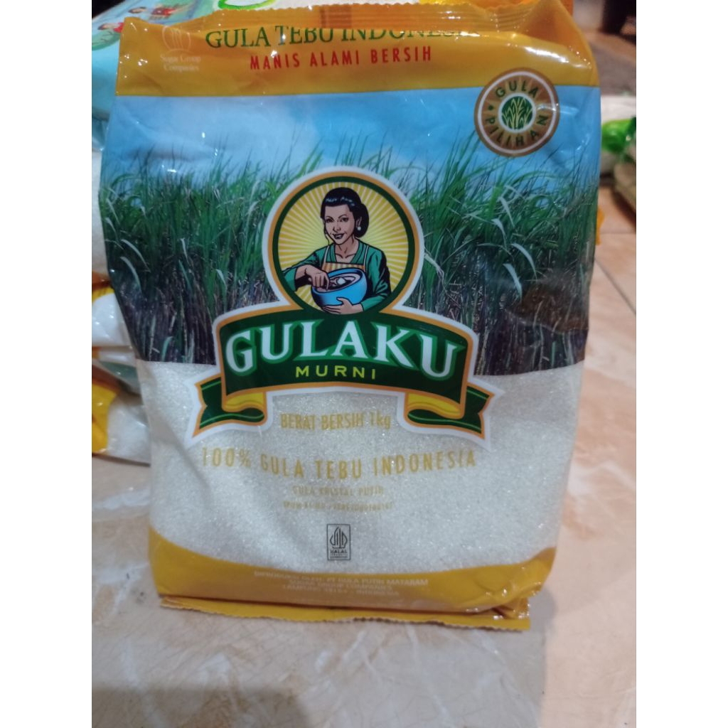 

Gulaku Kemasan 1kg kuning dan hijau