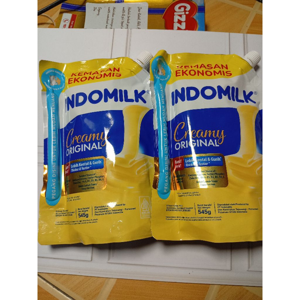 

INDOMILK POUCH 545gr ISI 12pcs & INDOMILK SACSET
