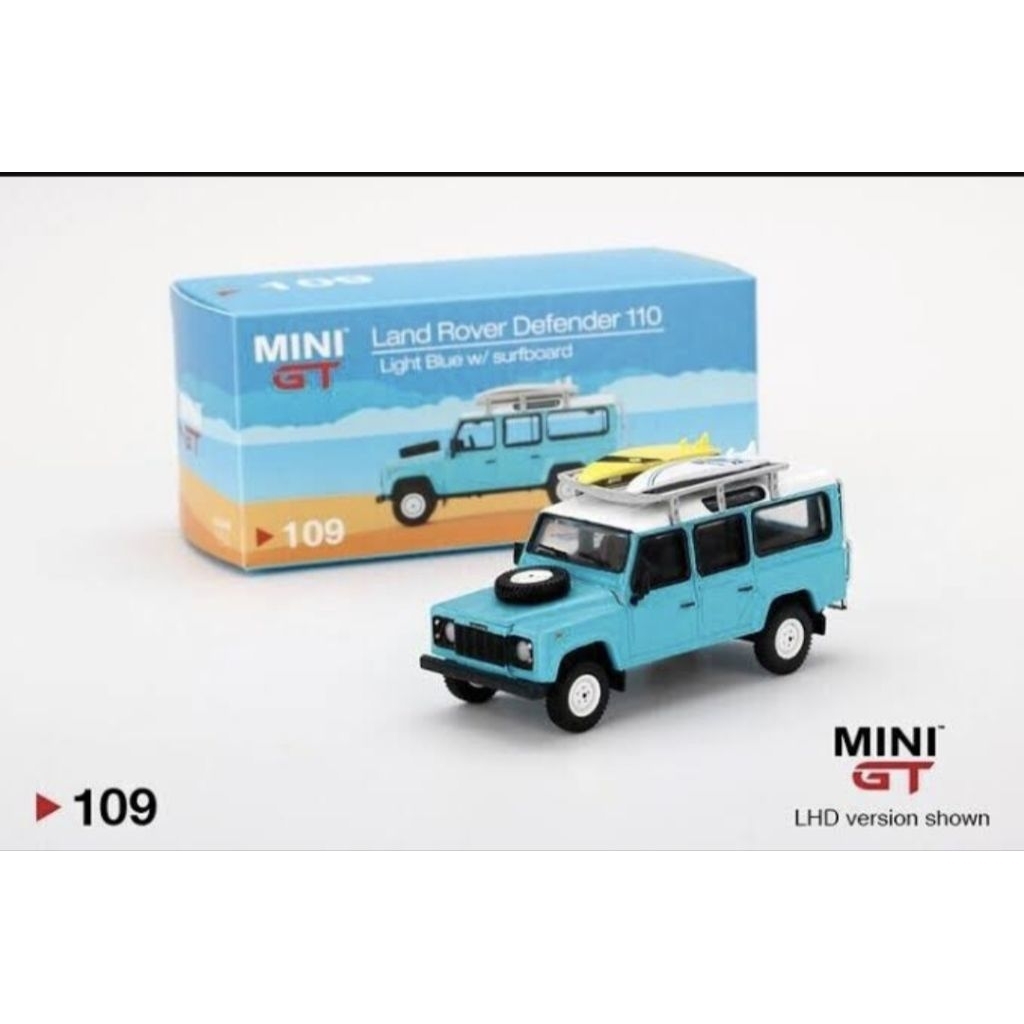 Mini GT 109 Land Rover Defender 110 Light Blue w/ Surfboard