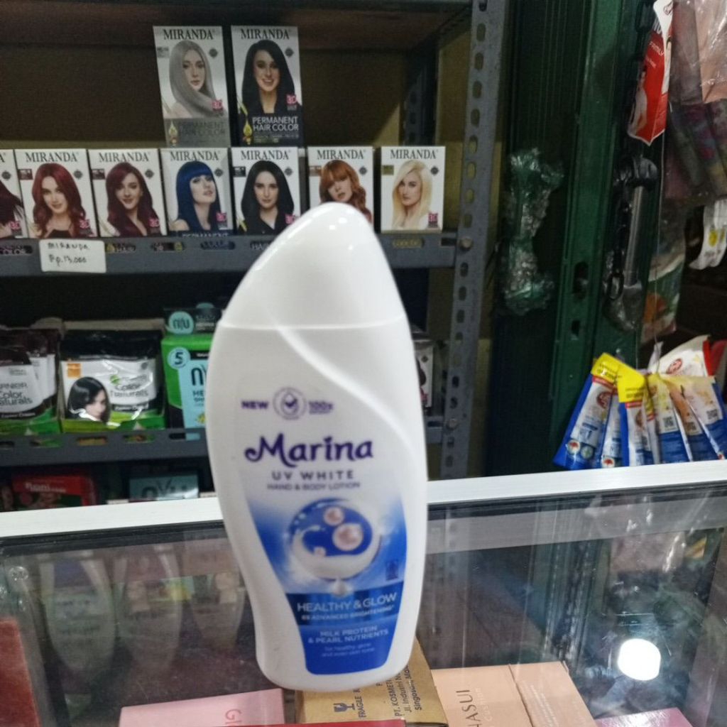 Handbody Marina UV White Biru