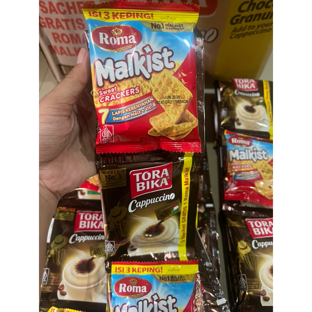

(PROMO 10 Sachet + 5 biskuit Malkist Roma) Kopi Tora bika Capucino 1 renceng free Malkis Roma