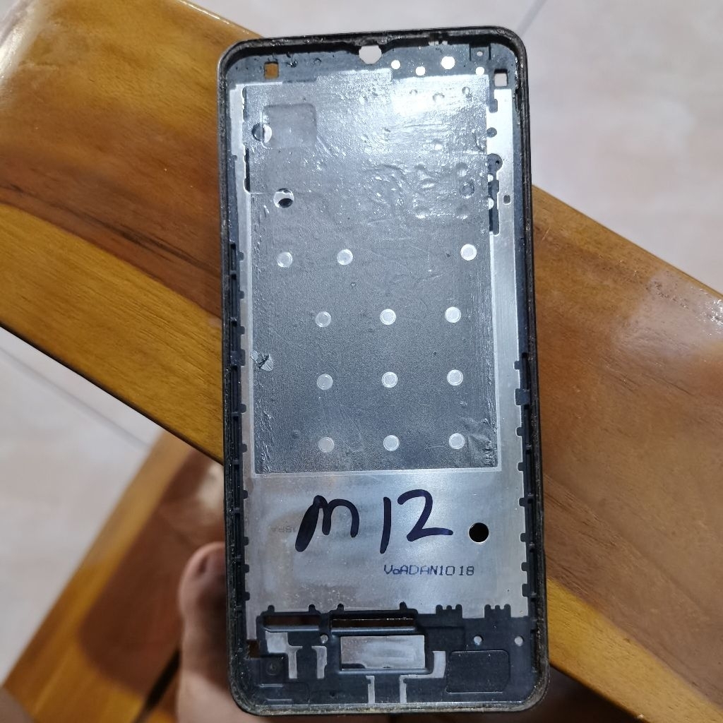 FRAME TATAKAN LCD SAMSUNG M12 ORI COPOTAN