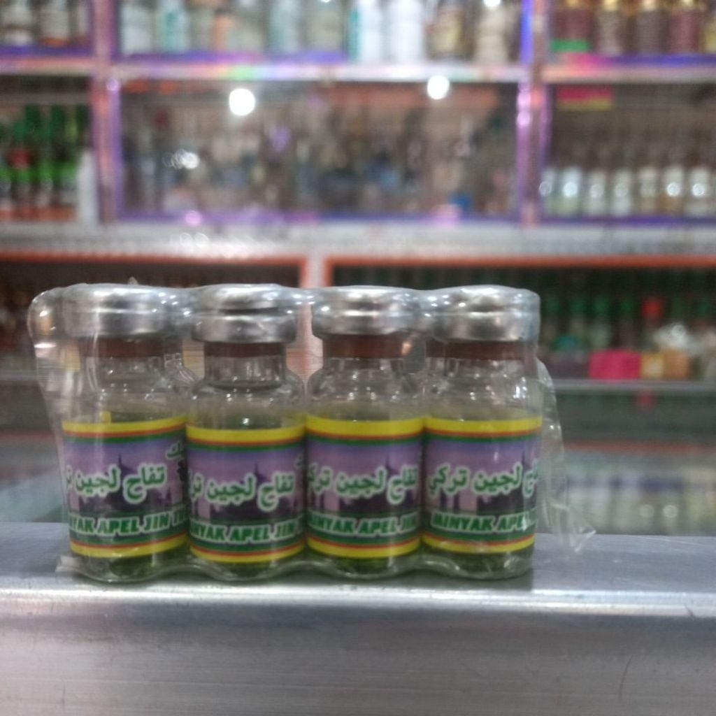 minyak apel  jin warna hijau