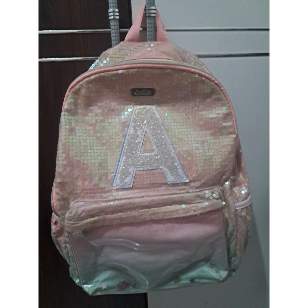 tas ransel justice insial A