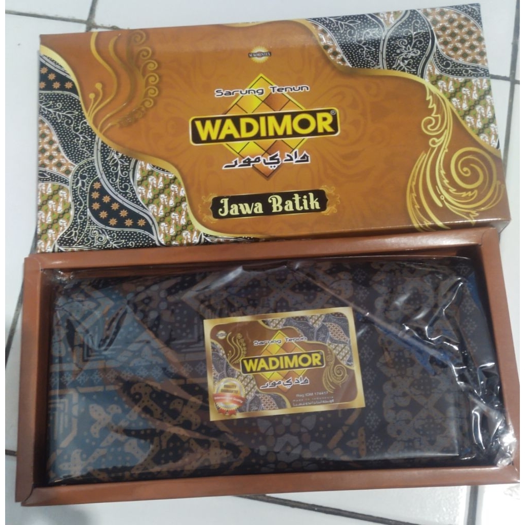 Sarung tenun wadimor bahan katun batik warna coklat tua
