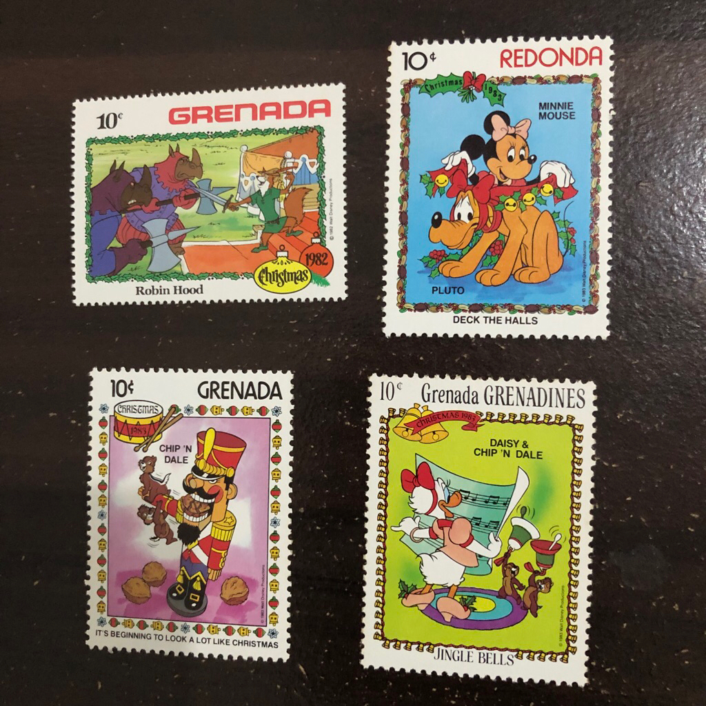 

1 pcs Perangko Anak Disney Stamp Grenada Grenadines Redonda Pluto Mickey Minnie Mouse and Friends Robin Hood Chip n and Dale Daisy Duck Deck the Halls Jingle Bells It’s Beginning to look a lot like Christmas Natal 82 1982