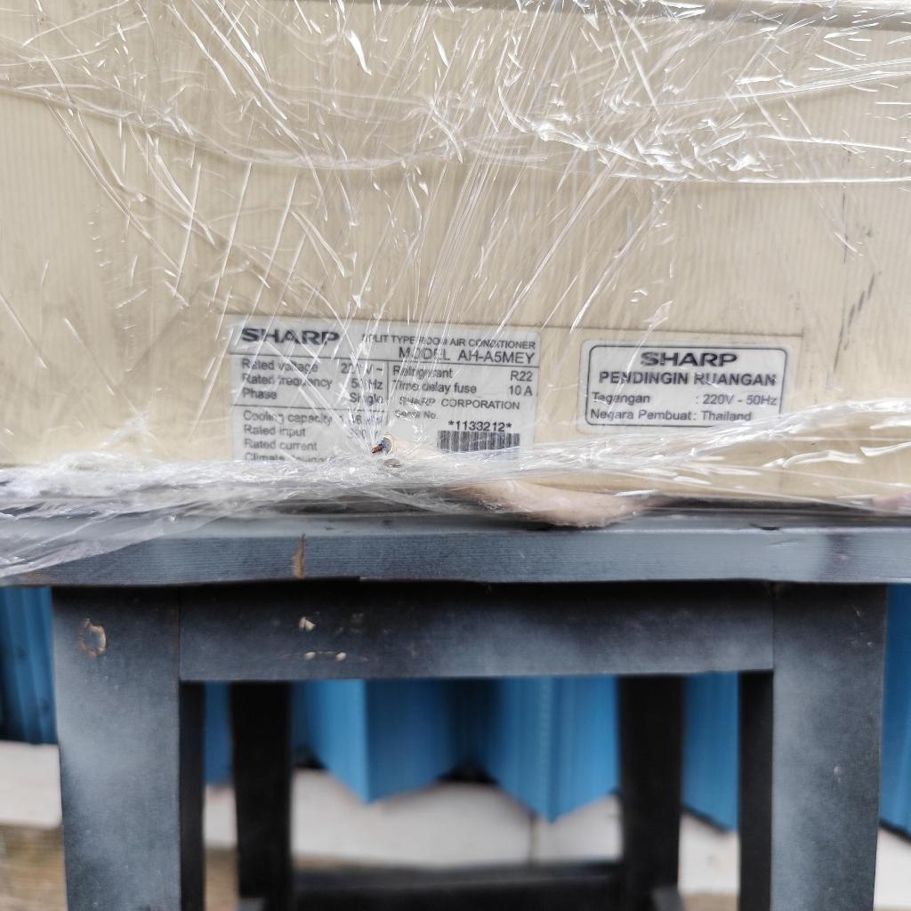 AC BEKAS AH-A5MEY BERKUALITAS SHARP OUTDOOR INDOOR 1/2 PK