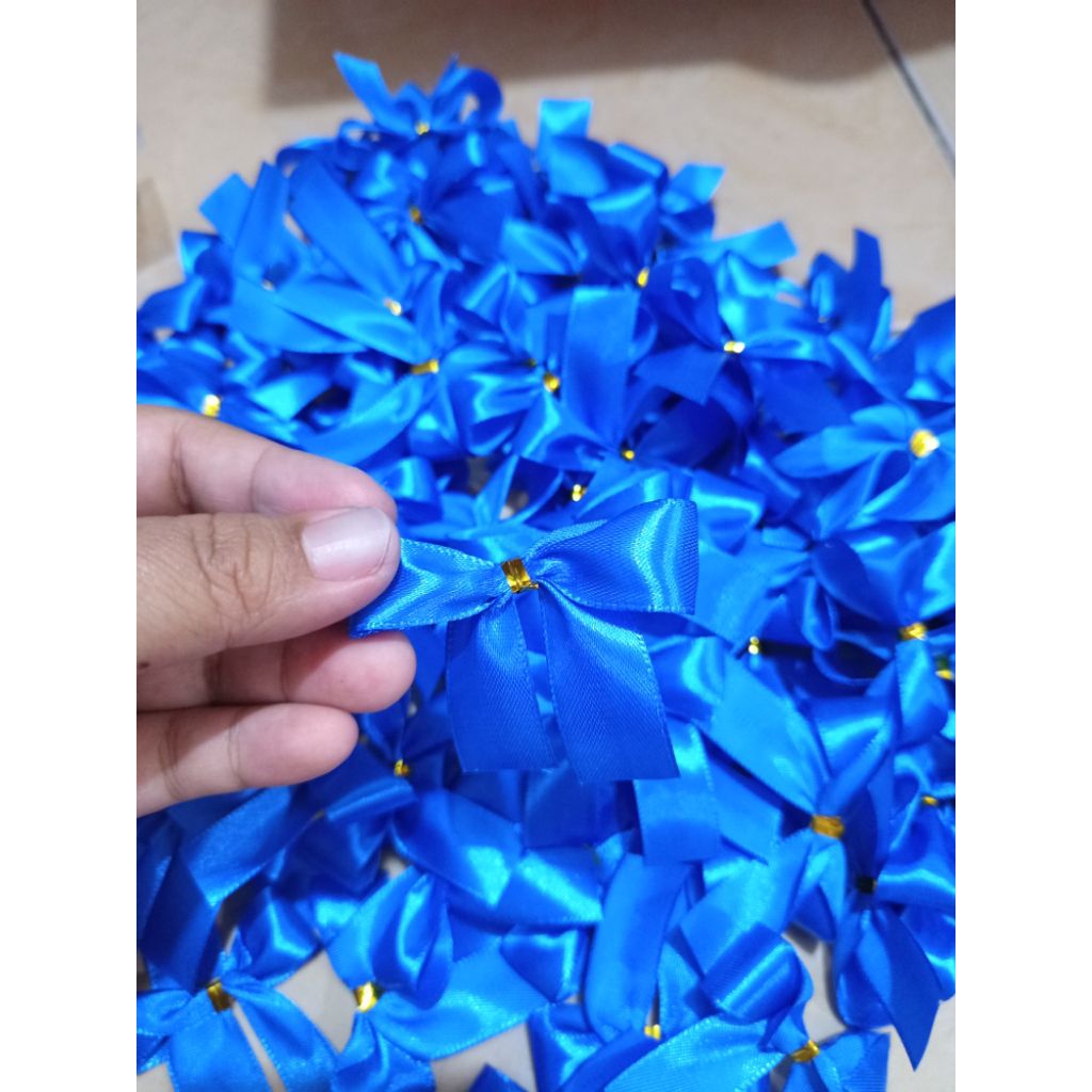 

Pita Satin Premium - Pita Satin - Pita Souvenir - Pita hampers - Pita tinggal tempel - Pita jadi - Pita Hiasan