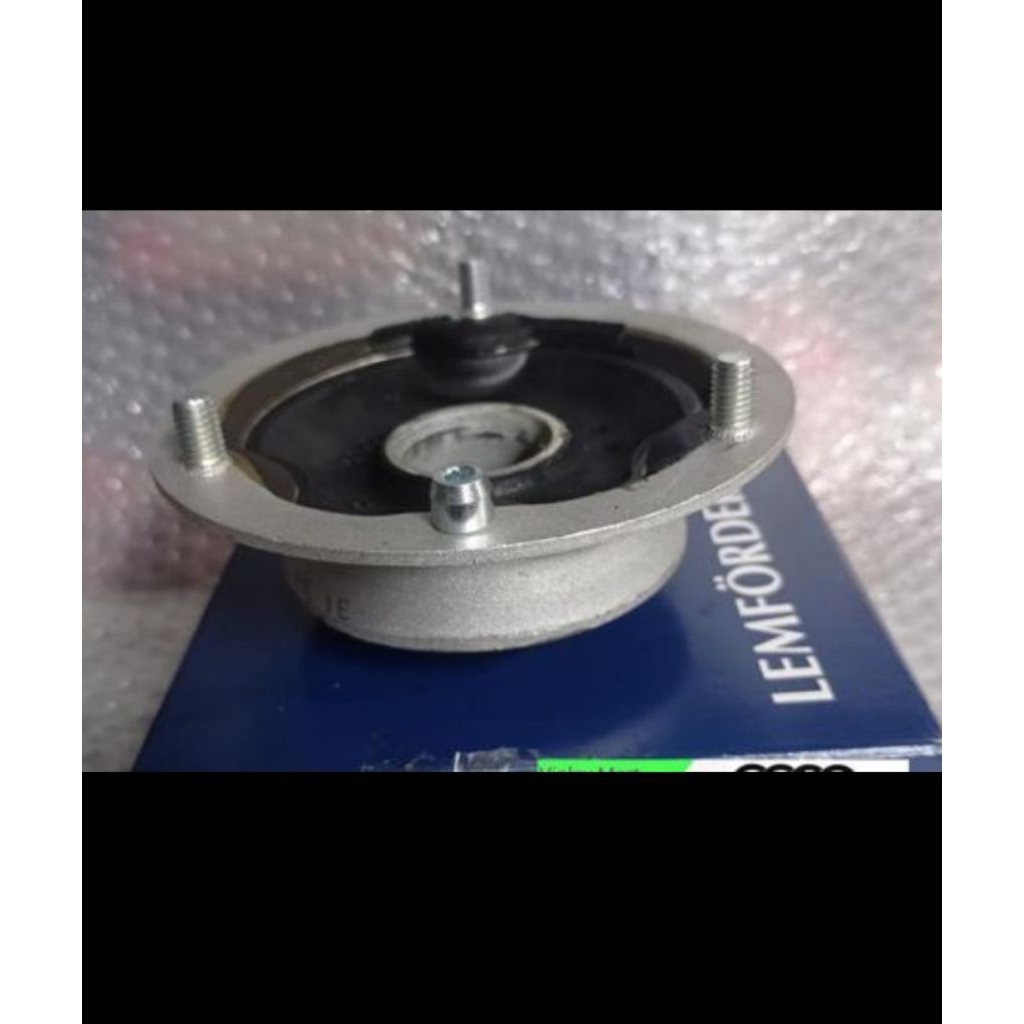 MOUNTING SUPORT SHOCK BREAKER DEPAN BMW E36