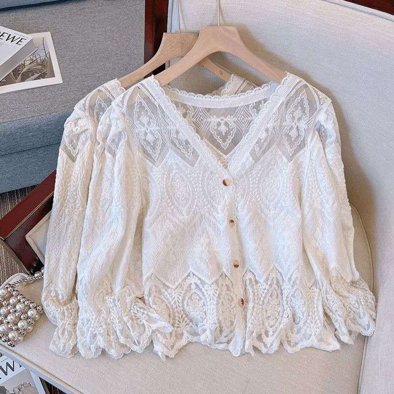 Blus brokat transparan motif etnik lengan panjang kancing depan wanita elegan