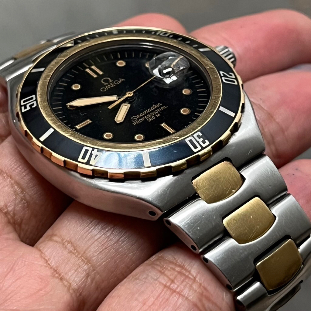 omega seamaster 200 big size solid gold bezel vintage diver pre bond