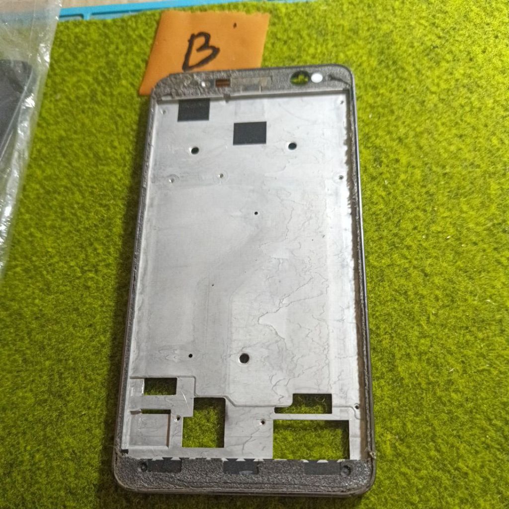 frame dudukan lcd speaker atas haier L7