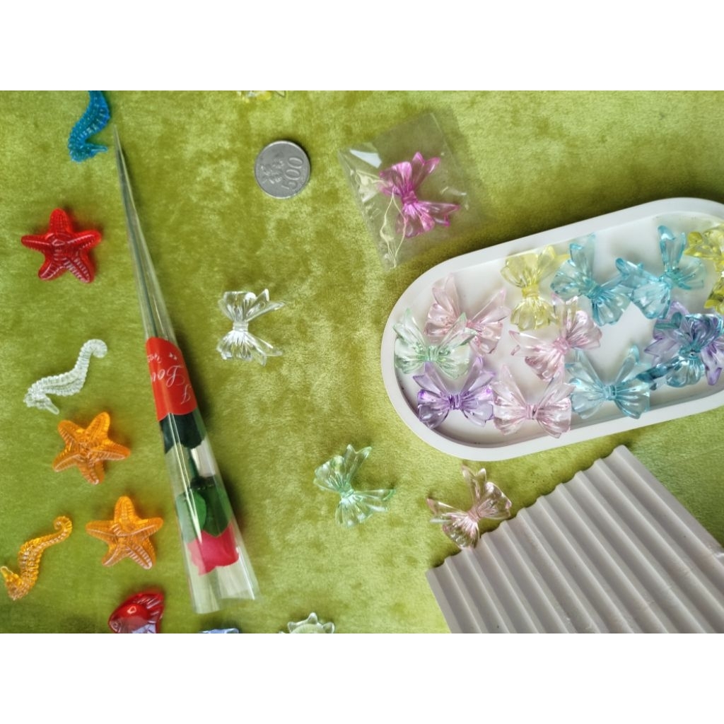 

1 pcs (Beli 2x dapat 3pcs) Manik Murah Pita Jurai Bening/ Manik Pita Kado