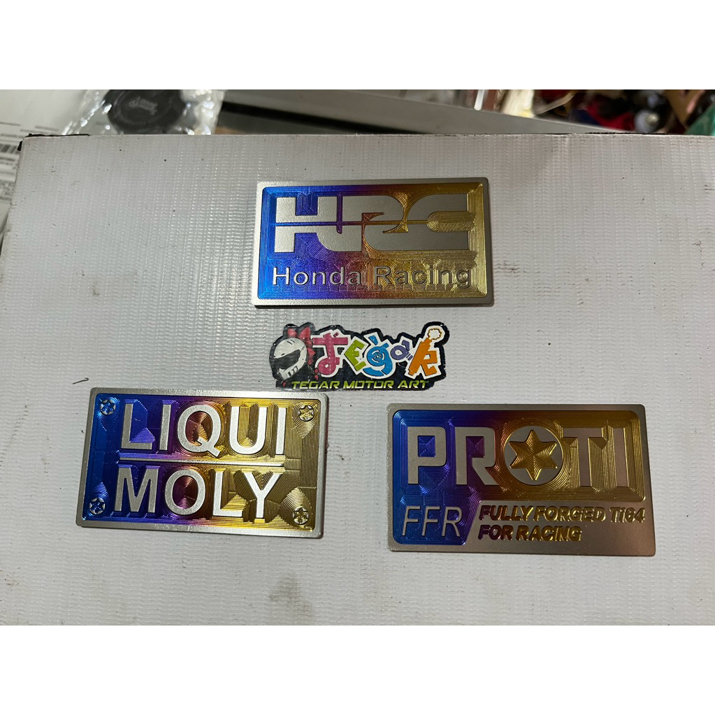 emblem hugger titanium proti hrc liquimoli