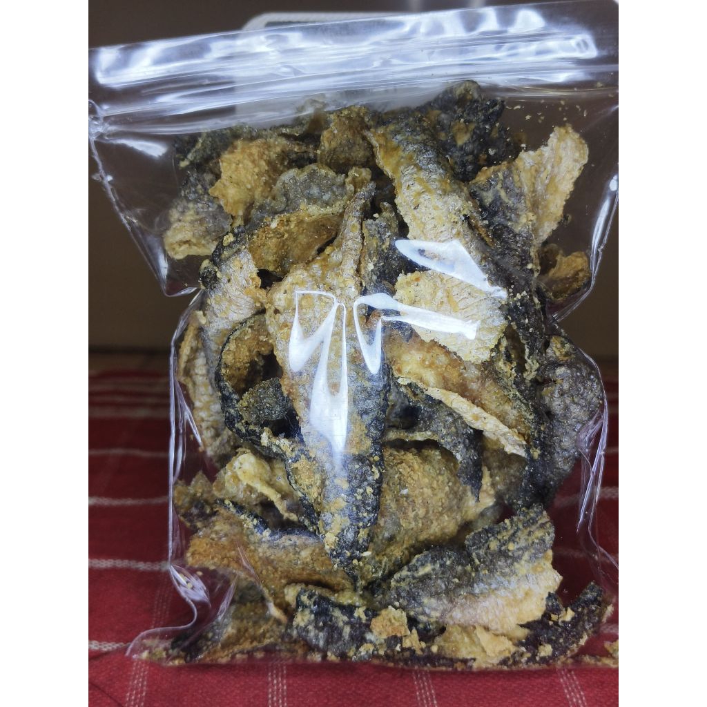 

KERIPIK KULIT IKAN PATIN /SNACK CEMILAN KULIT IKAN PATIN ORIGINAL 100 GRAM