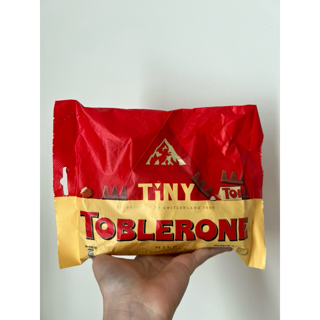 

TOBLERONE TINY GOLD 200gr isi 25 PCS