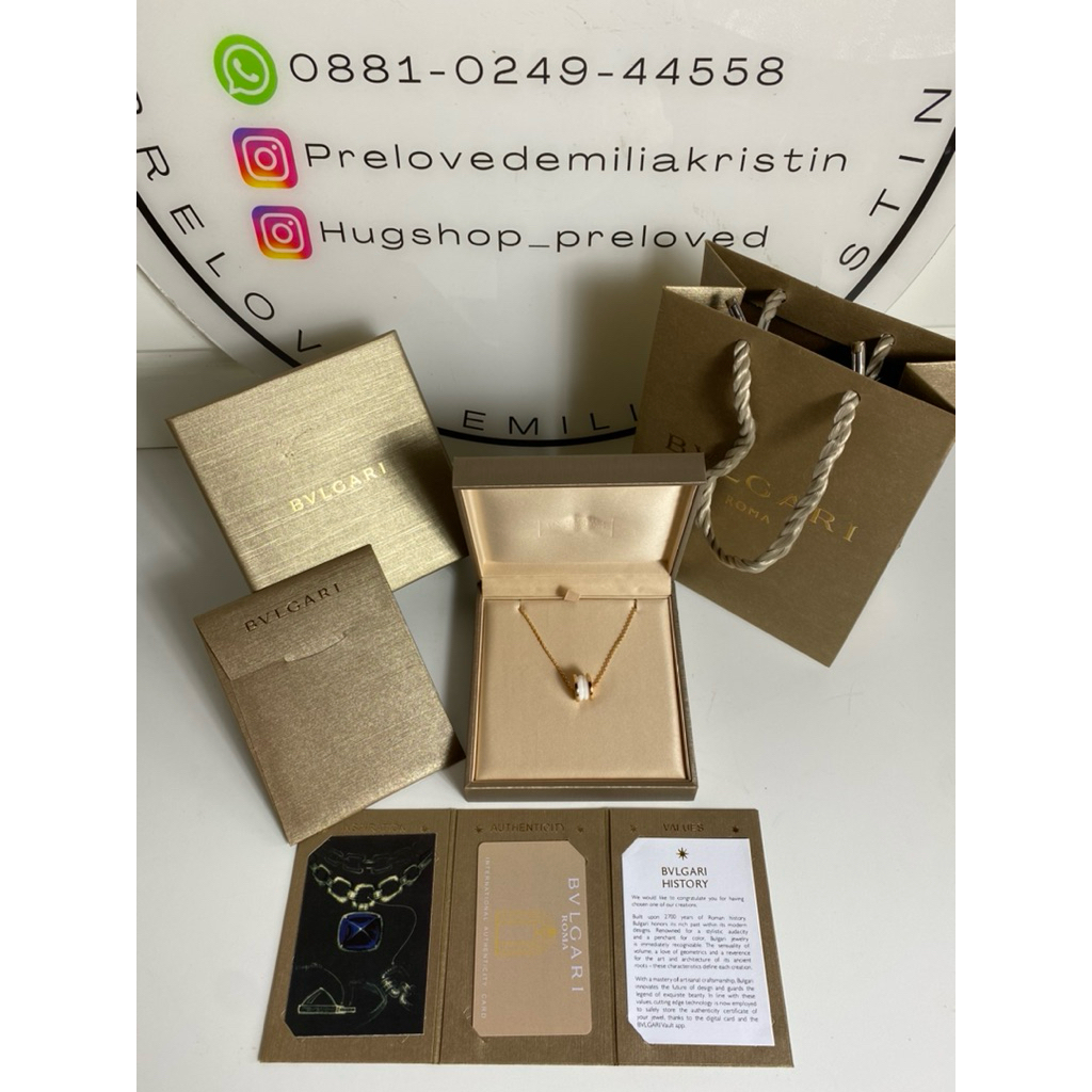 Preloved b.zero1 white ceramic gold pendant necklace Authentic