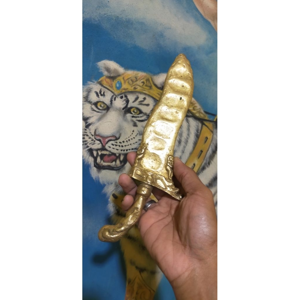 B. Omyang kuningan Autentik 1