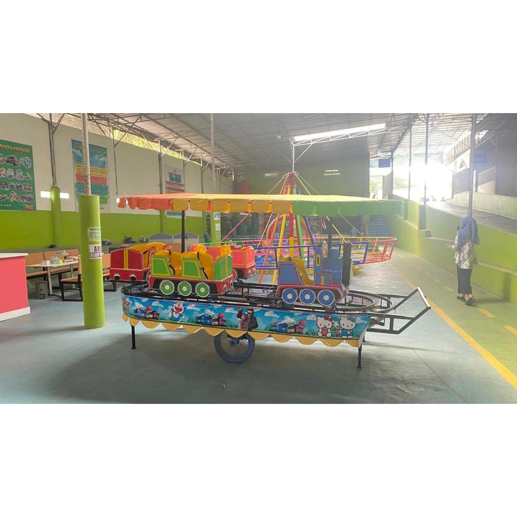 Odong odong Kereta Panggung TAYO Double Jok 4 gerbong