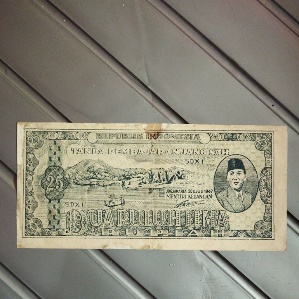 25 rupiah SDX thn 1947 asli bekas beredar