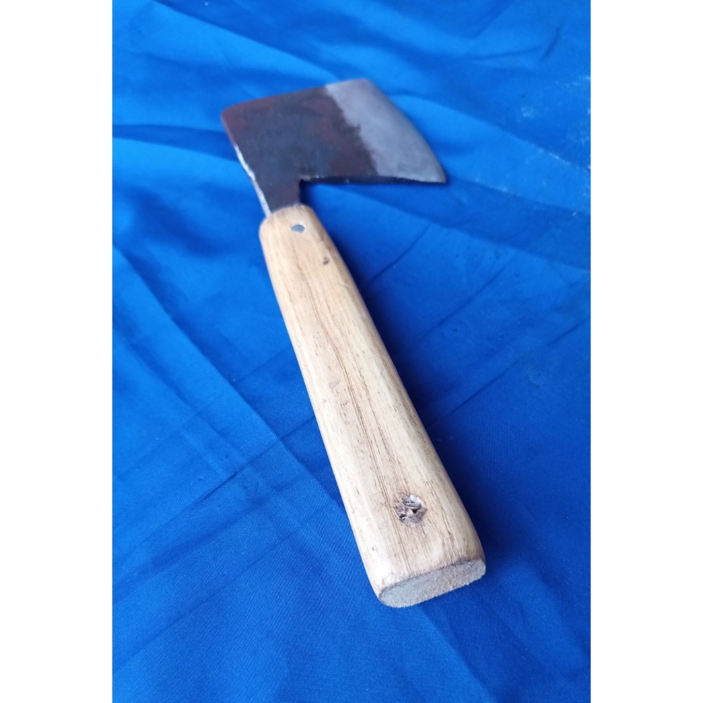 pisau kupas kulit kelapa