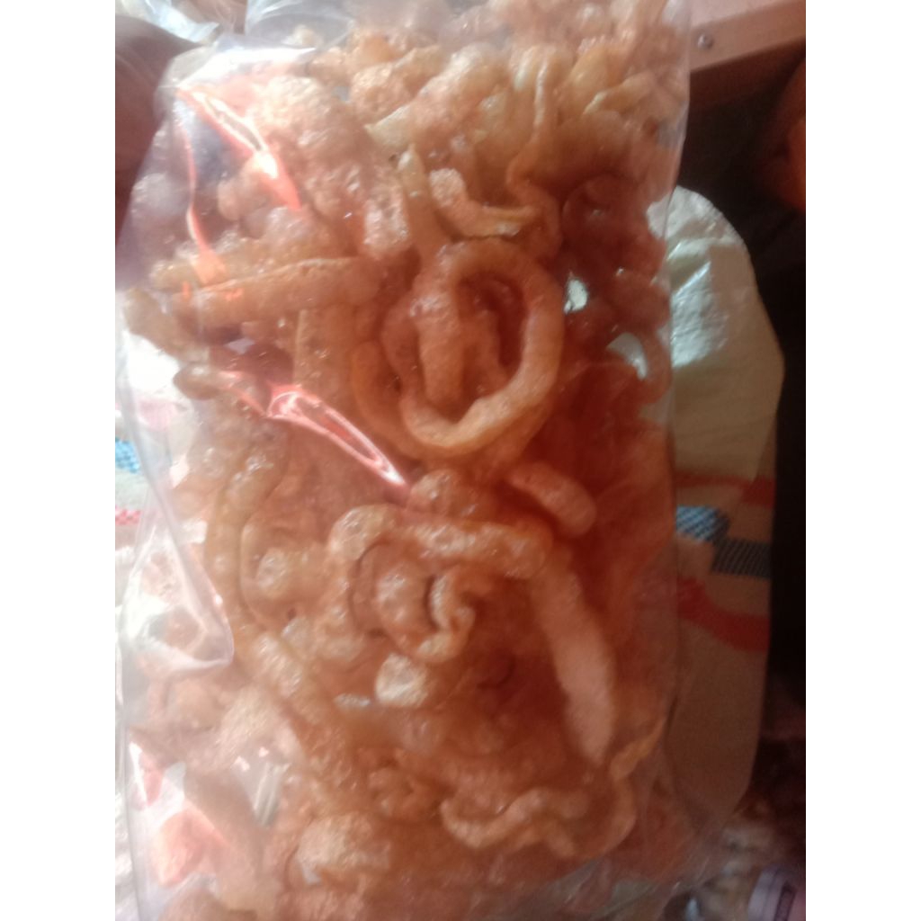 

KERUPUK KULIT KERBAU SEKALI GORENG / SETENGAH MATANG