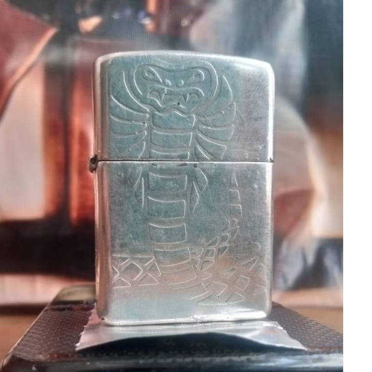 original zippo red eyed viper silver flat bottom