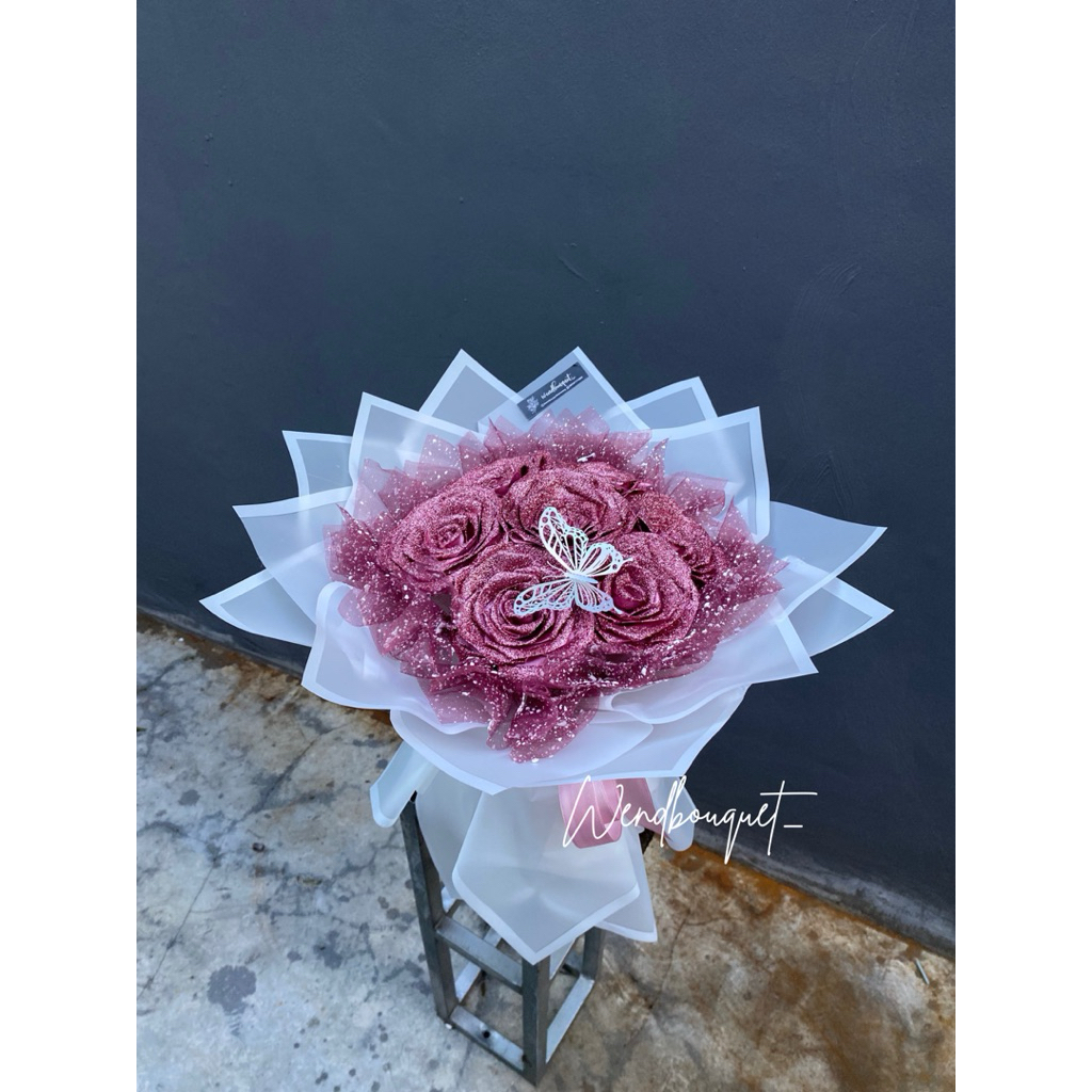 

Buket pita satin 7 tangkai