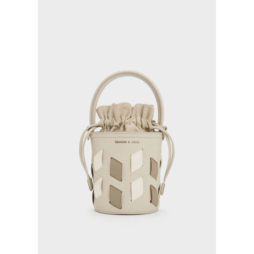 Preloved tas Charles & Keith Original Bucket Canvas Panelled - Taupe S