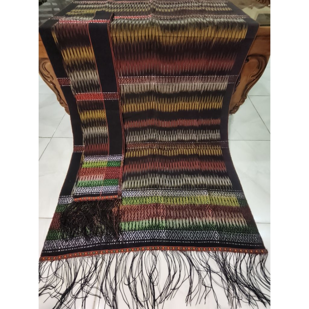 Hiou Tapak catur pakaian adat wanita simalungun