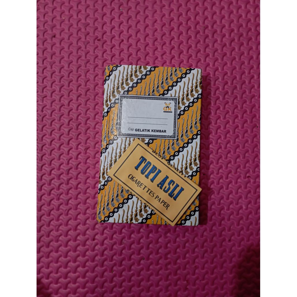

buku tulis glatik TOPI kuning 1 ikat