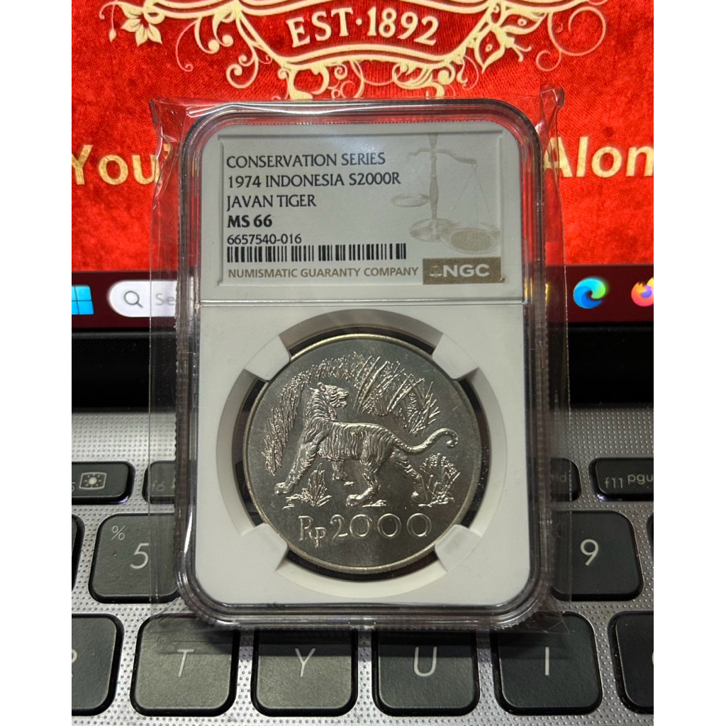 KOIN PERAK 2000 RUPIAH 1974 MACAN NGC MS 66