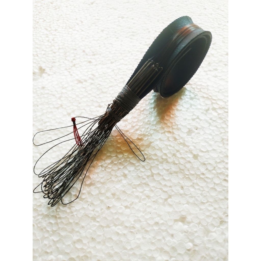 Racik tekukur , jerat atau jebak tekukur