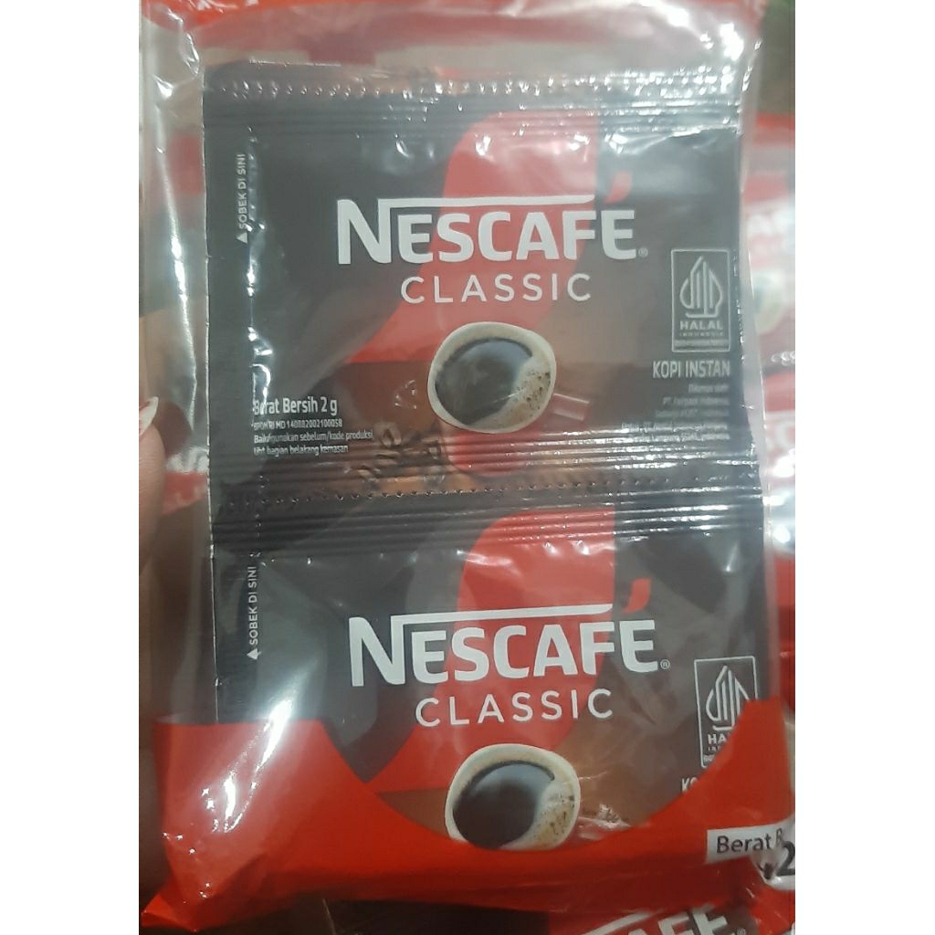 

Nescafe Classic Kopi Hitam Kopi Murni (1 Renteng isi 10 Sachet)