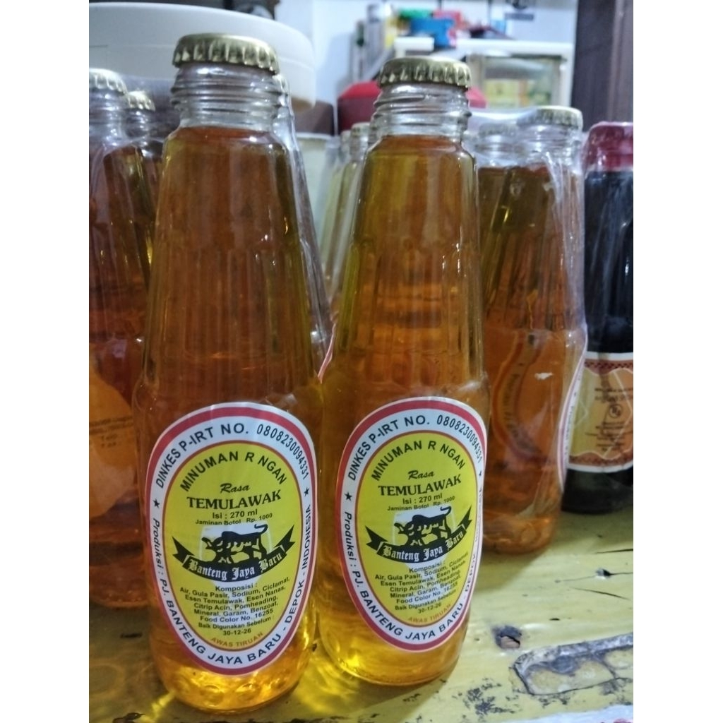 

MINUMAN SARI AKAR TEMULAWAK 2 BOTOL X 270 ML MINUMAN TRADISIONAL MINUMAN JADUL