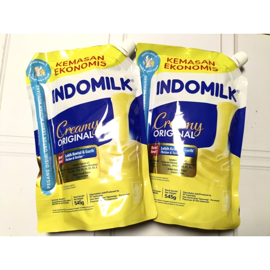 

DINA.INDOMILK POUCH 545gr & INDOMILK SACSET