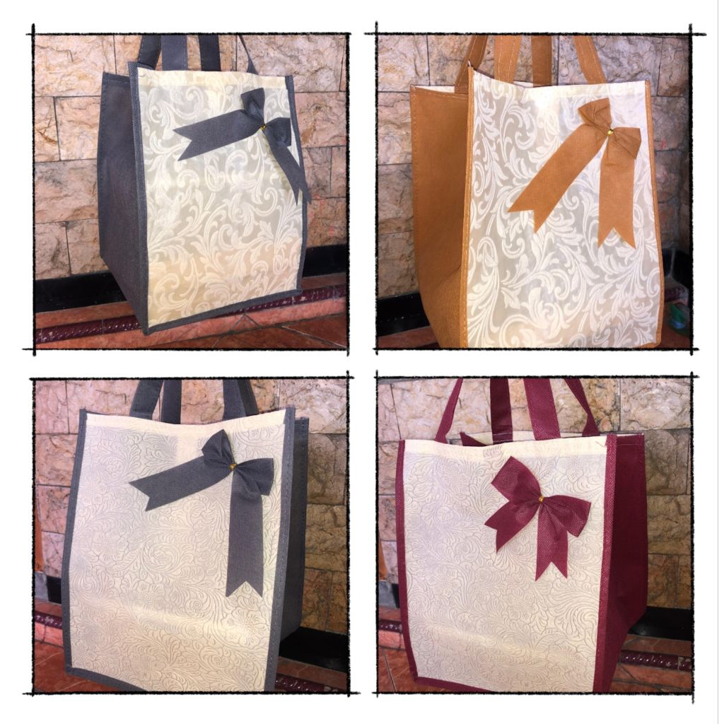 

Tas Hajatan Embos Pita Ukuran 20 x 20 x 28 cm/Tas Kotak Nasi/goodie Bag/ Tas Spunbond