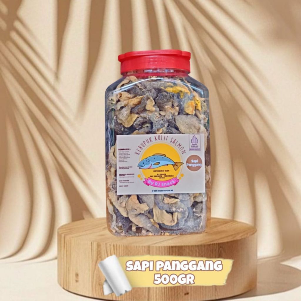 

Kerupuk Kulit Ikan Salmon Cemilan Crunchy Varian Rasa Sapi Panggang Kemasan Toples Double Jumbo