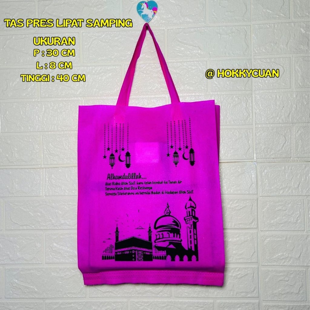 

Tas oleh oleh haji dan umroh sablon//30cm x 8cm x 40cm//tas spunbond//1lusin isi 12pcs