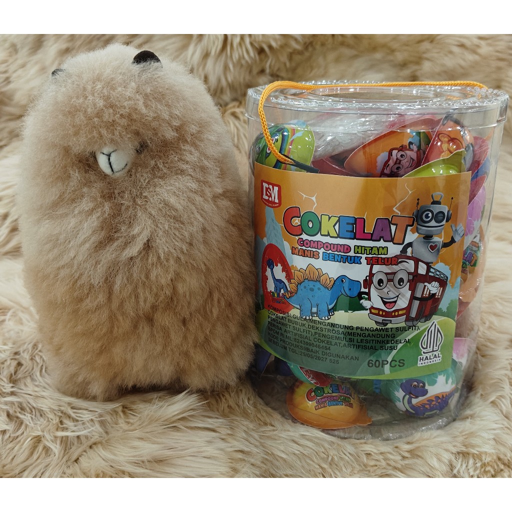 

DSM Cokelat Compound Hitam Manis Bentuk Telur, 60 pcs