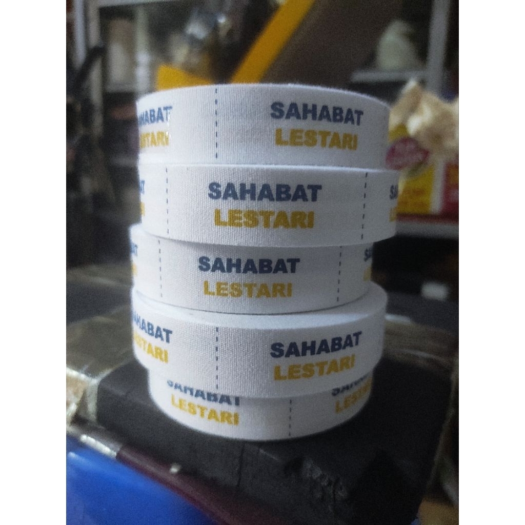 

Sablon label hijab pita katun 3 cm 2 warna
