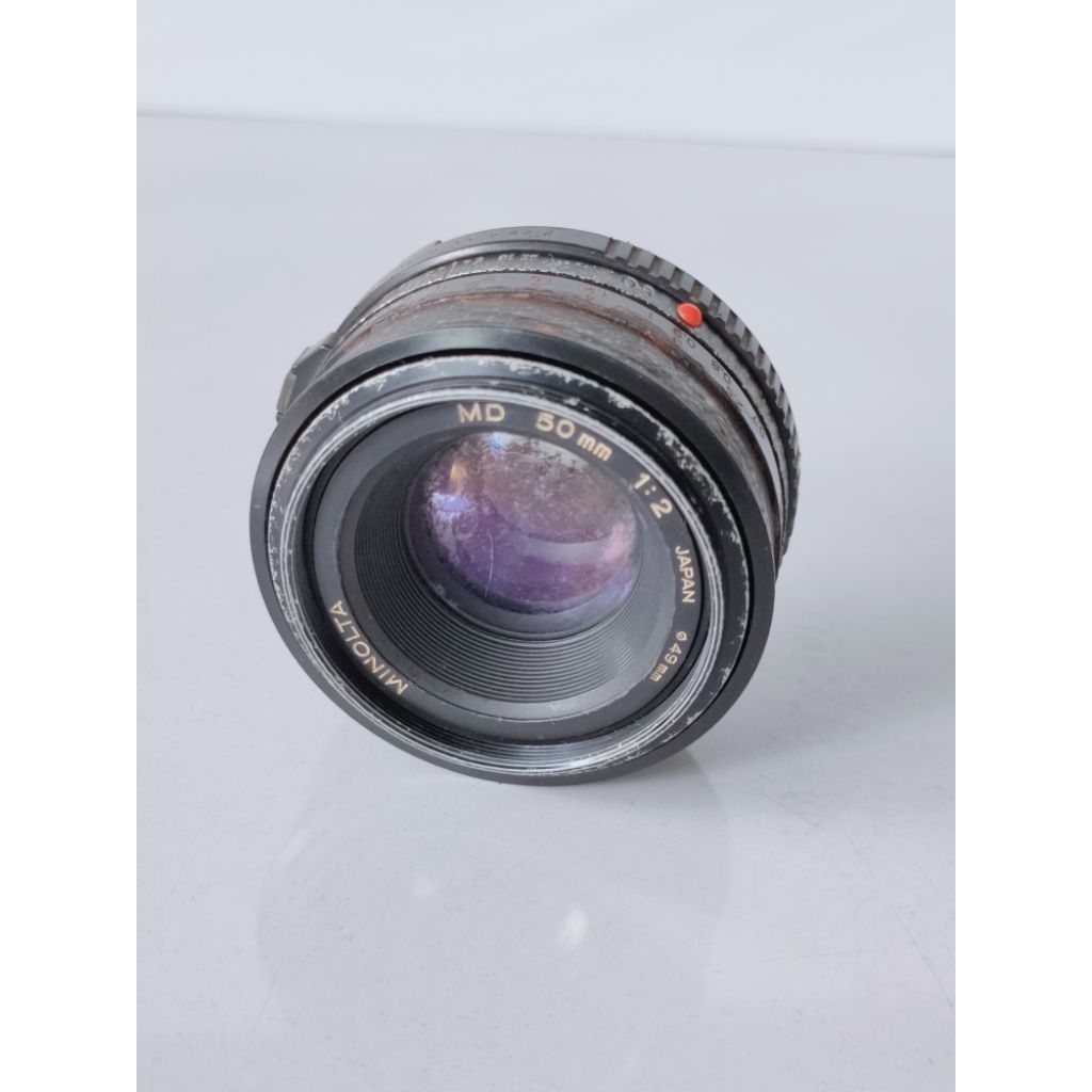 Lensa kamera SLR analog vintage Minolta lens 50mm 1:2 japan classic camera photo film part koleksi k