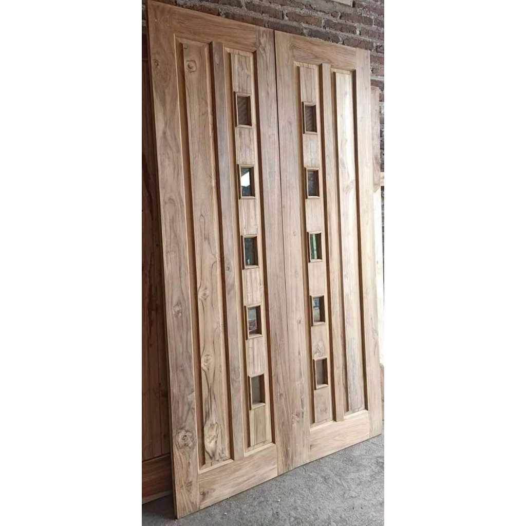 Daun pintu utama - kupu tarung -kayu jati