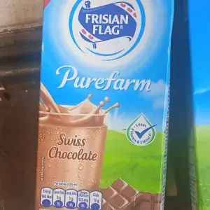 

Frisian Flag Susu UHT225 ml Swiss Cokelat