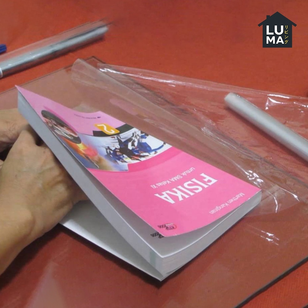 

Plastik Buku Kitab 65 cm x 10 Meter Sampul Mika Tebal Roll Bening Plastic Book Cover